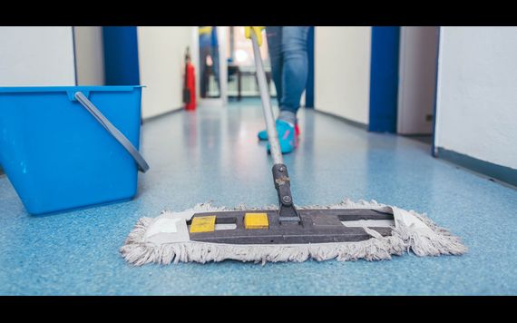 Cleaning corridor in health centre Medical centre and GP surgery cleaning services