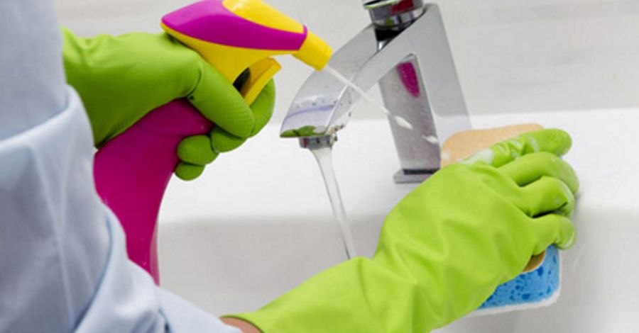 cleaner cleaning bathroom