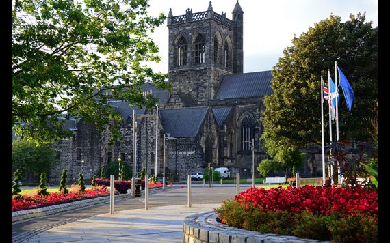 Facade of the Paisley Abbey parish church in Paisley, Scotland A facade of the Paisley Abbey parish church in Paisley, Scotland